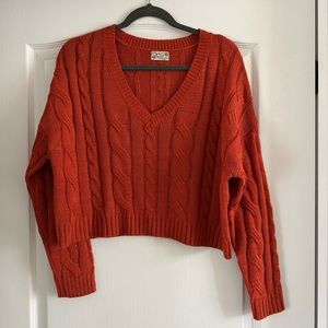Women’s orange crop top sweater